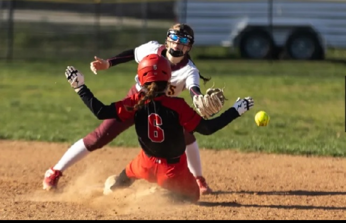 Action photo — rounding third base